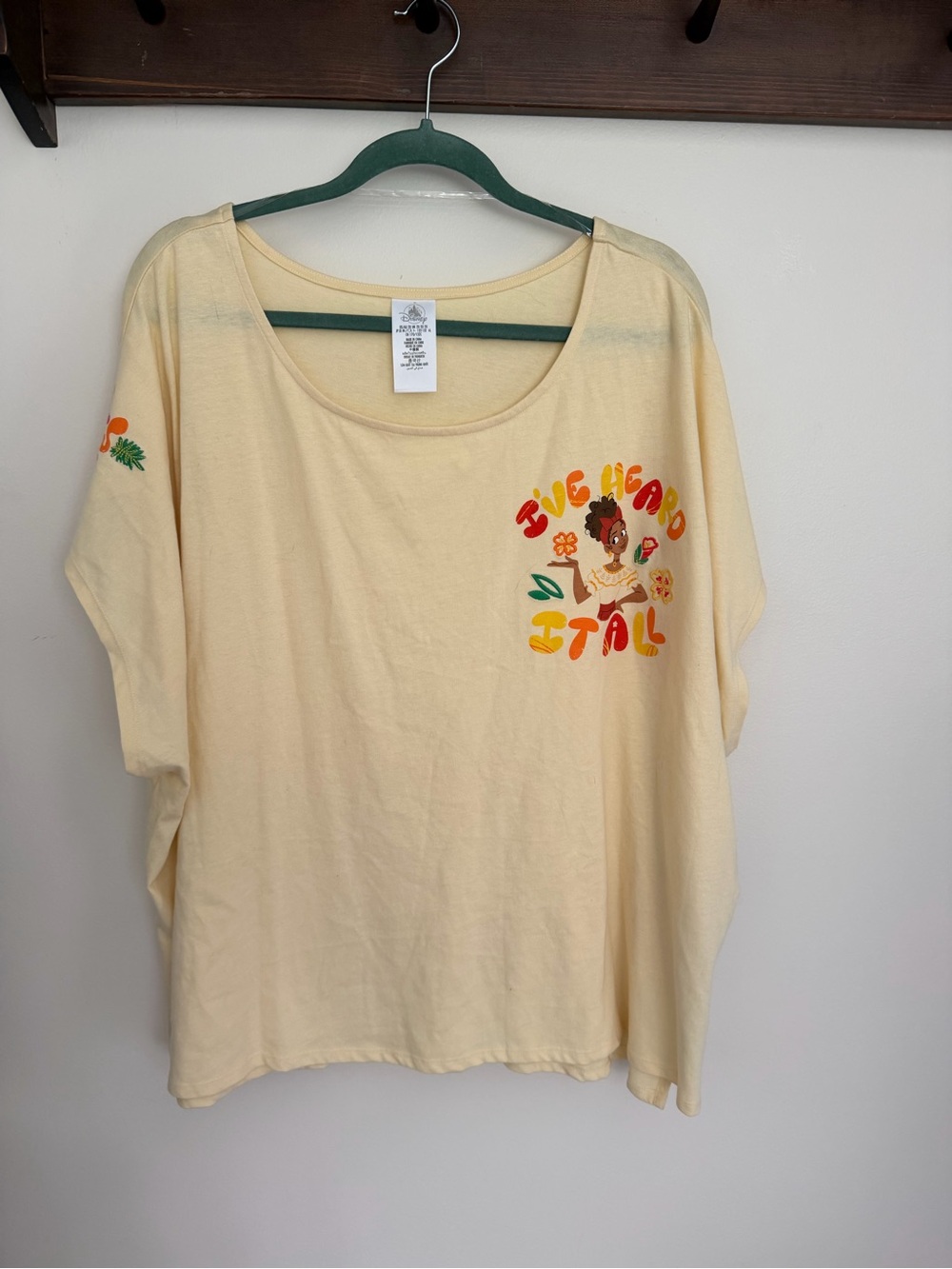 Disney Cream Short Sleeve Tee with Colorful Floral Graphic